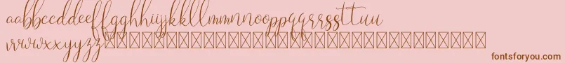 Laryo Font – Brown Fonts on Pink Background