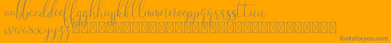 Laryo-Schriftart – Graue Schriften auf orangefarbenem Hintergrund