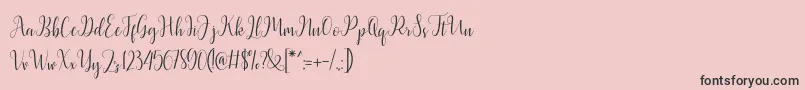 Fonte Latasha Script – fontes pretas em um fundo rosa