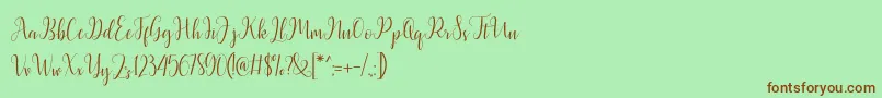 Latasha Script Font – Brown Fonts on Green Background