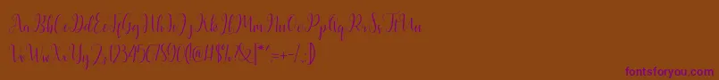 Latasha Script-Schriftart – Violette Schriften auf braunem Hintergrund