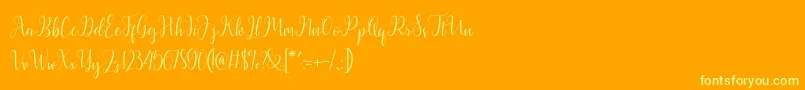 Latasha Script-Schriftart – Gelbe Schriften auf orangefarbenem Hintergrund