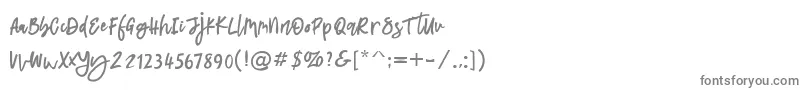 フォントLatifah – 白い背景に灰色の文字