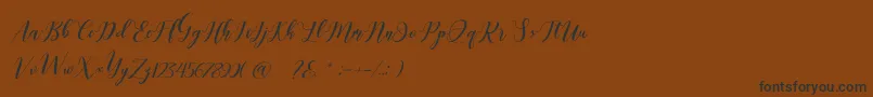 Latte coffee Script-Schriftart – Schwarze Schriften auf braunem Hintergrund