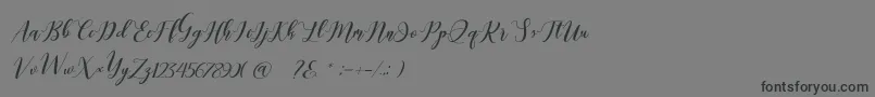 Latte coffee Script-Schriftart – Schwarze Schriften auf grauem Hintergrund