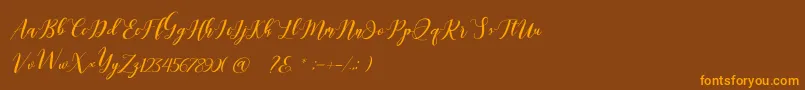 Latte coffee Script-Schriftart – Orangefarbene Schriften auf braunem Hintergrund