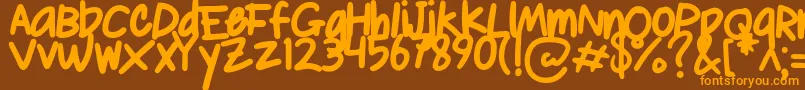 Czcionka Le Lissage Bold   Demo – pomarańczowe czcionki na brązowym tle