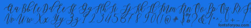 Fonte Leadent Script – fontes pretas em um fundo azul