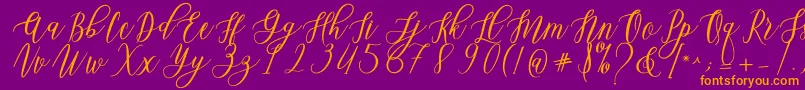 Leadent Script Font – Orange Fonts on Purple Background