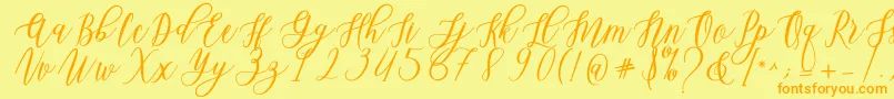 Leadent Script-Schriftart – Orangefarbene Schriften auf gelbem Hintergrund