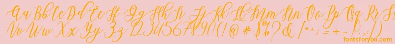 Leadent Script Font – Orange Fonts on Pink Background