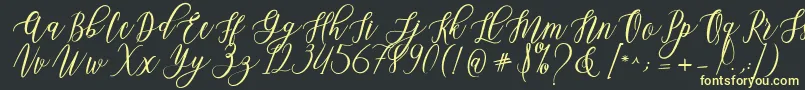 Leadent Script Font – Yellow Fonts on Black Background