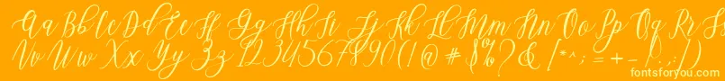 Leadent Script Font – Yellow Fonts on Orange Background