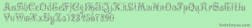 Leafy Glade Font – Gray Fonts on Green Background