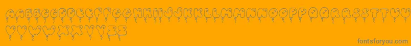 JiBalloonCaps-Schriftart – Graue Schriften auf orangefarbenem Hintergrund