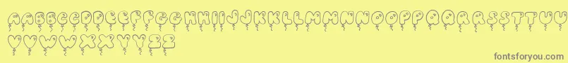 JiBalloonCaps Font – Gray Fonts on Yellow Background