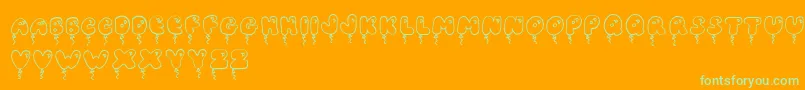 JiBalloonCaps Font – Green Fonts on Orange Background