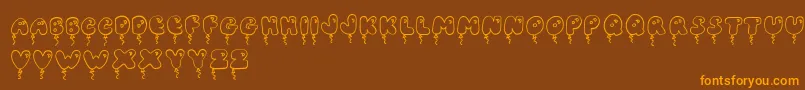 JiBalloonCaps Font – Orange Fonts on Brown Background