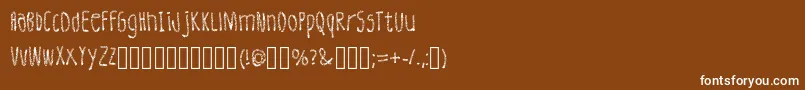 Шрифт LeatherFont Regular – белые шрифты на коричневом фоне