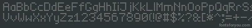 Więcej informacji o czcionce led board 7 Czcionka led board 7 – szare czcionki na czarnym tle