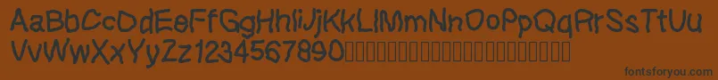 Lefthandkids demo Font – Black Fonts on Brown Background