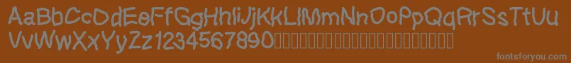 Lefthandkids demo Font – Gray Fonts on Brown Background