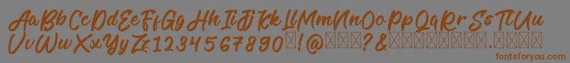 フォントLegilatureFree – 茶色の文字が灰色の背景にあります。