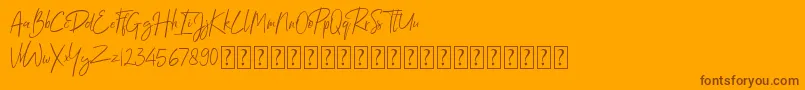 Lemonday demo version Font – Brown Fonts on Orange Background