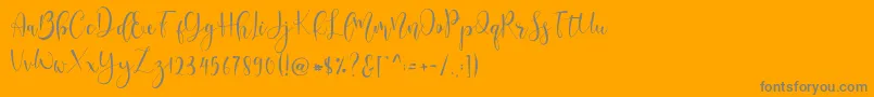 Lerina Script-Schriftart – Graue Schriften auf orangefarbenem Hintergrund