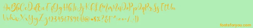 Czcionka Lerina Script – pomarańczowe czcionki na zielonym tle