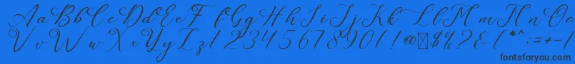 LeslieDawn Font – Black Fonts on Blue Background