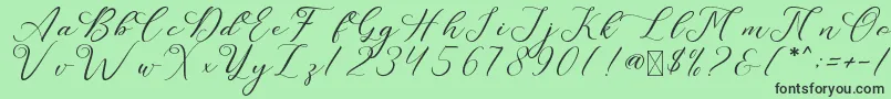 LeslieDawn-Schriftart – Schwarze Schriften auf grünem Hintergrund