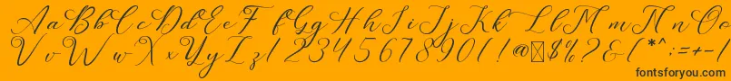 LeslieDawn-Schriftart – Schwarze Schriften auf orangefarbenem Hintergrund