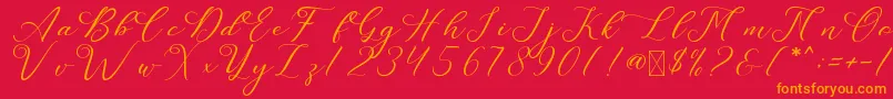 LeslieDawn Font – Orange Fonts on Red Background