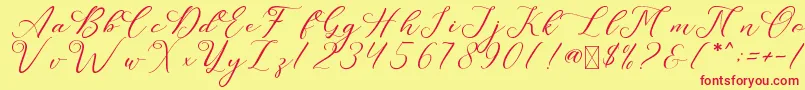 LeslieDawn-Schriftart – Rote Schriften auf gelbem Hintergrund