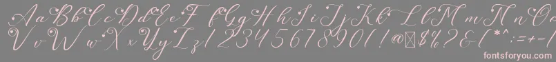 LeslieDawnLove-fontti – vaaleanpunaiset fontit harmaalla taustalla