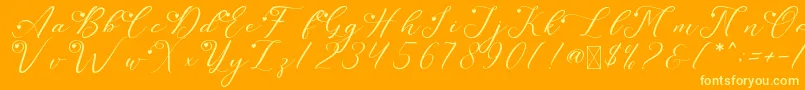 フォントLeslieDawnLove – オレンジの背景に黄色の文字