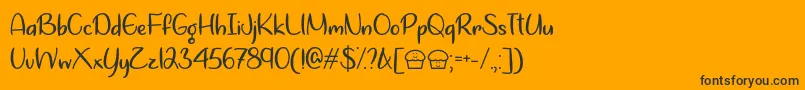 Lets Bake Muffins  -Schriftart – Schwarze Schriften auf orangefarbenem Hintergrund