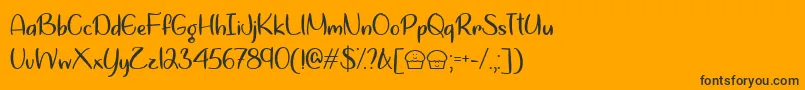 Lets Bake Muffins  -Schriftart – Schwarze Schriften auf orangefarbenem Hintergrund