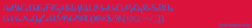 Lets Bake Muffins  -Schriftart – Blaue Schriften auf rotem Hintergrund