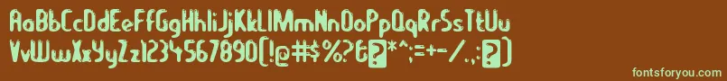 lets eat Font – Green Fonts on Brown Background