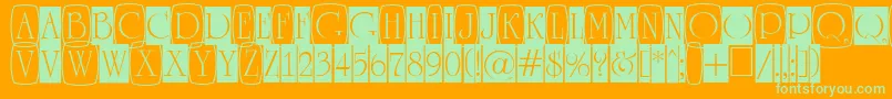 ARomanusttlcmd3cb-fontti – vihreät fontit oranssilla taustalla