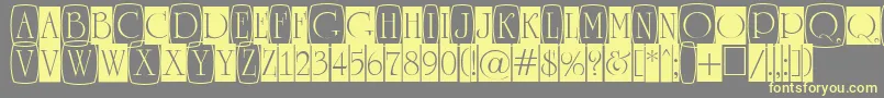 ARomanusttlcmd3cb Font – Yellow Fonts on Gray Background