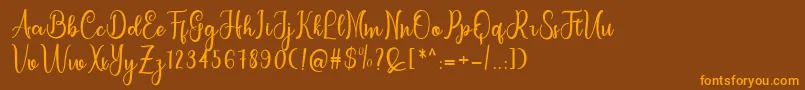letterbest Font – Orange Fonts on Brown Background
