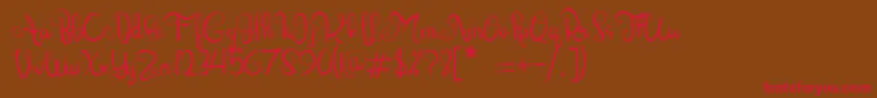 Lettering Script-Schriftart – Rote Schriften auf braunem Hintergrund