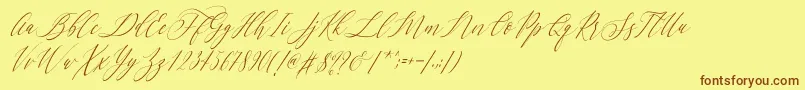 フォントLetternisa Slant   – 茶色の文字が黄色の背景にあります。