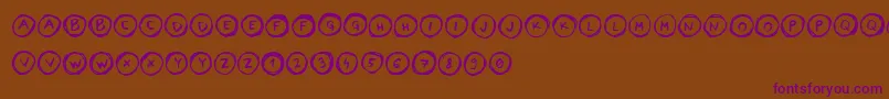 fuente LettersinCircles – Fuentes Moradas Sobre Fondo Marrón