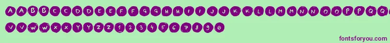 LettersinCirclesBook Font – Purple Fonts on Green Background