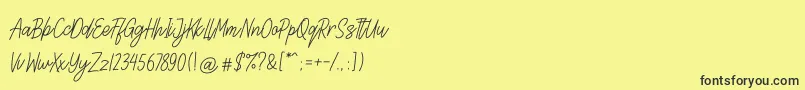 Lettia Font – Black Fonts on Yellow Background