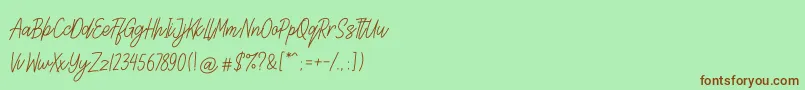 Lettia Font – Brown Fonts on Green Background